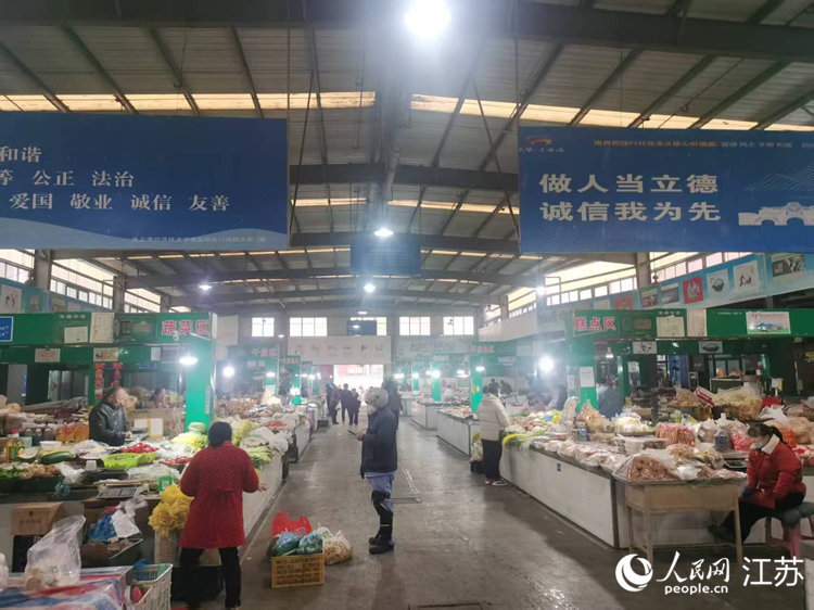 清晨的藤花紫郡菜市场。人民网 李欣阳摄